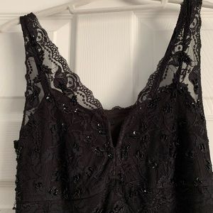 Black beaded dress. Barely worn. Size 4